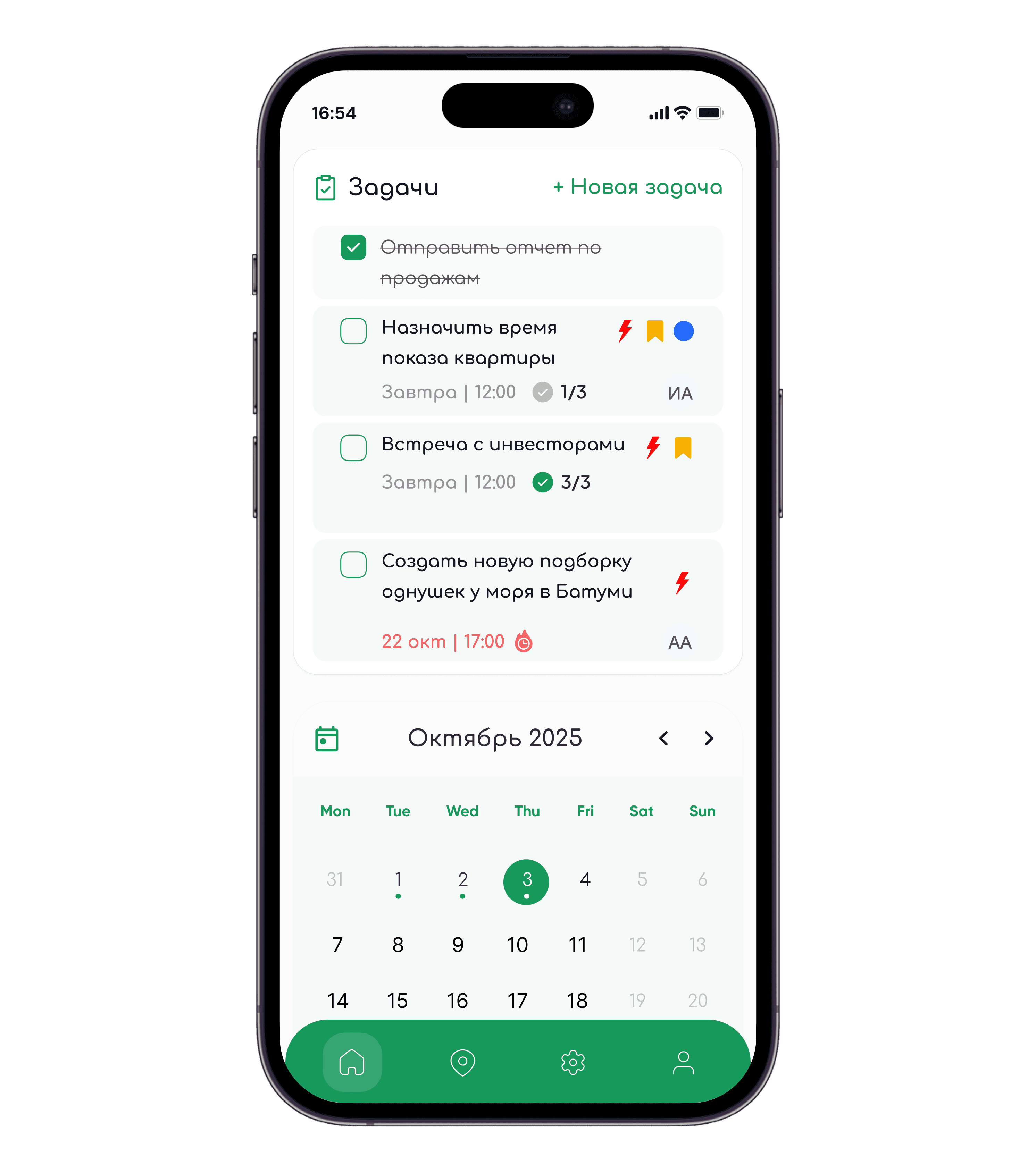 The mobile build on a phone — the day's tasks with deadlines and subtask progress above a month calendar